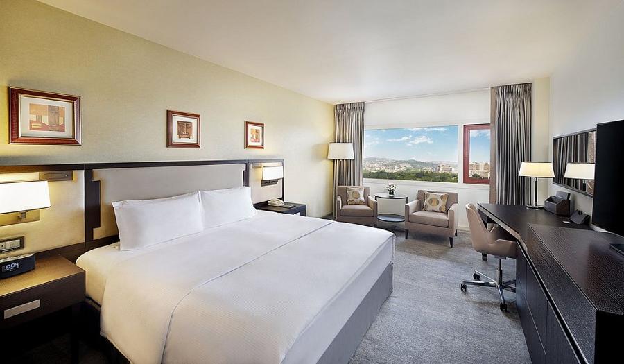 Tranquil local hotel room with city view